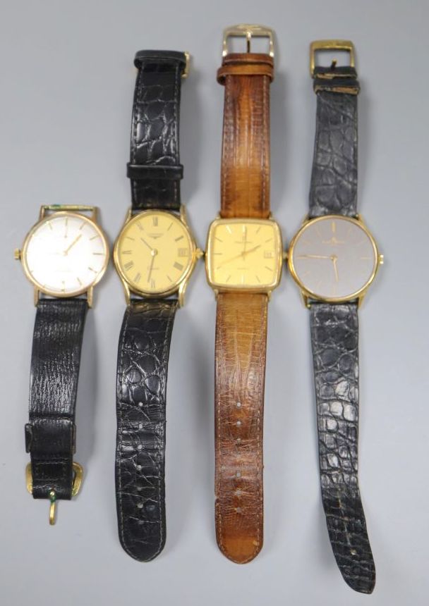 A gentlemans 18ct gold Baume & Mercier manual wind dress wrist watch & 3 other 9ct gold watches.